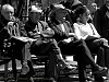 'Siesta #7' - Bogota, Colombia. <br>Spectators watching a street performer playing music